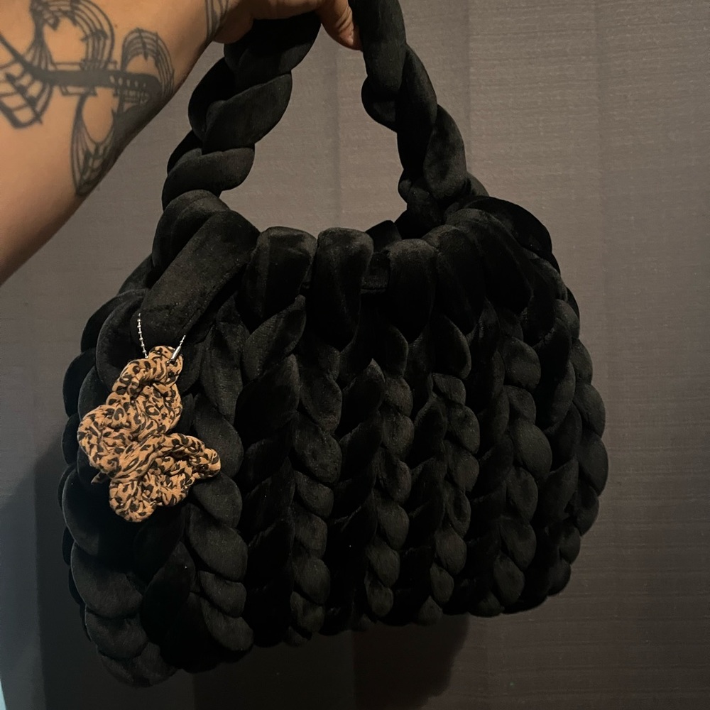 Hand knitted large Suede purse.